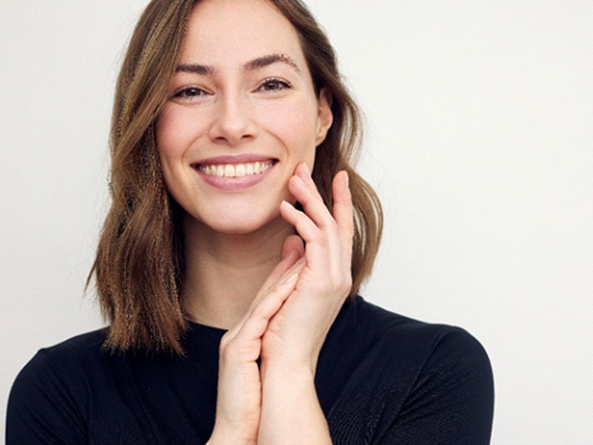 Closeup of woman with beautiful teeth smiling